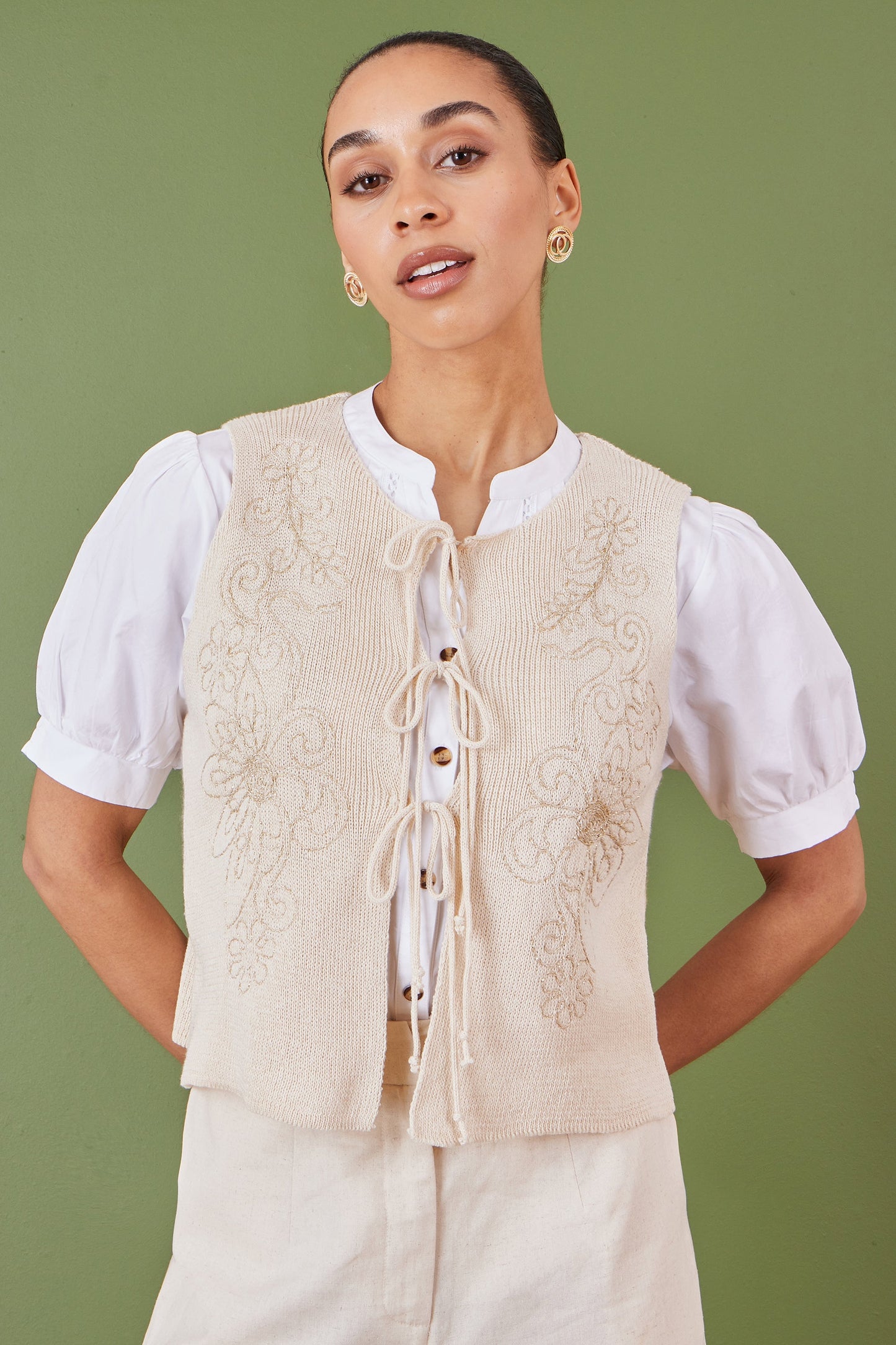 Beige Knitted Tie Front Waistcoat With Floral Details