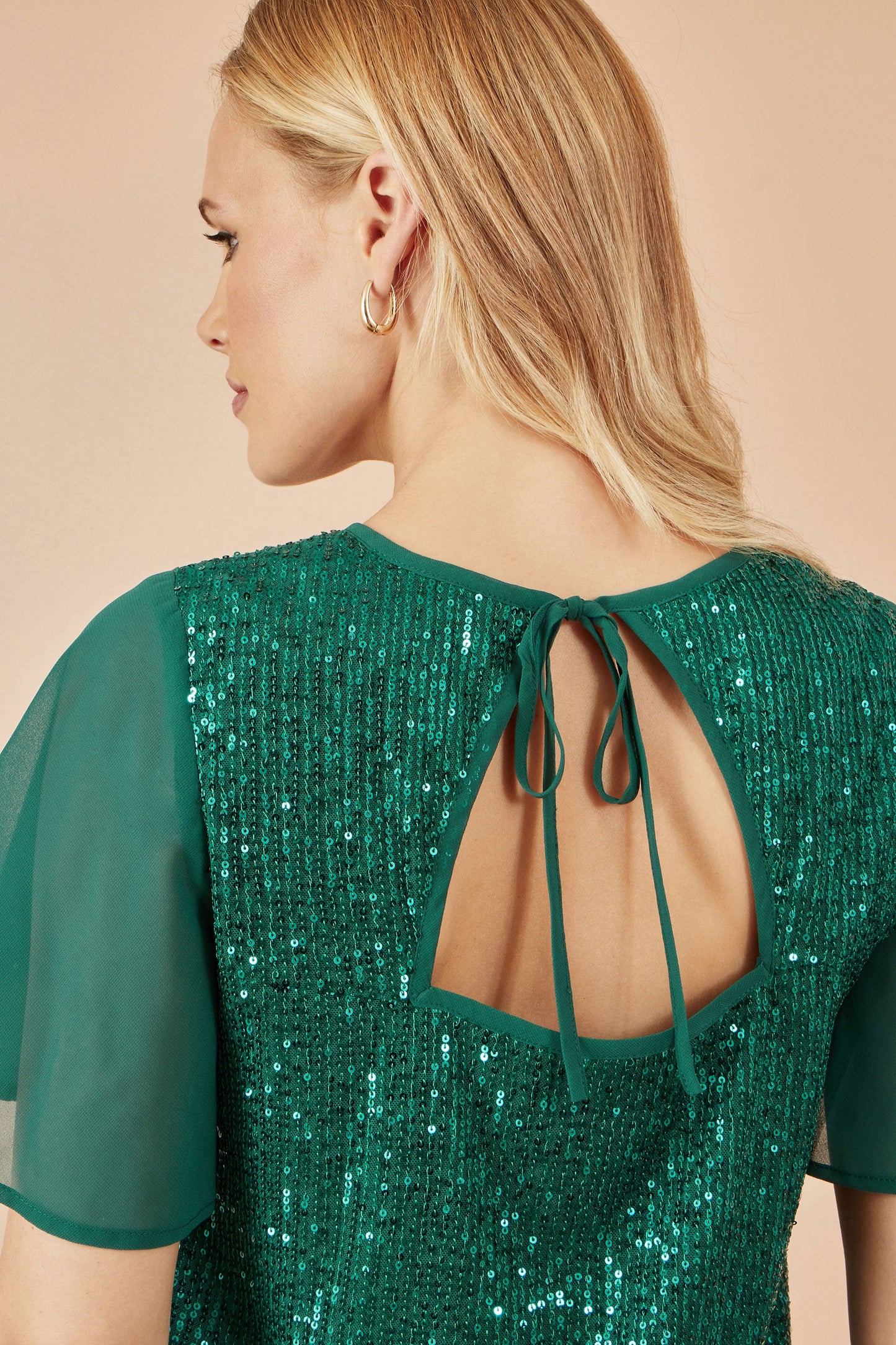 Green Sequin Top With Sheer Sleeves And Cut Out Back