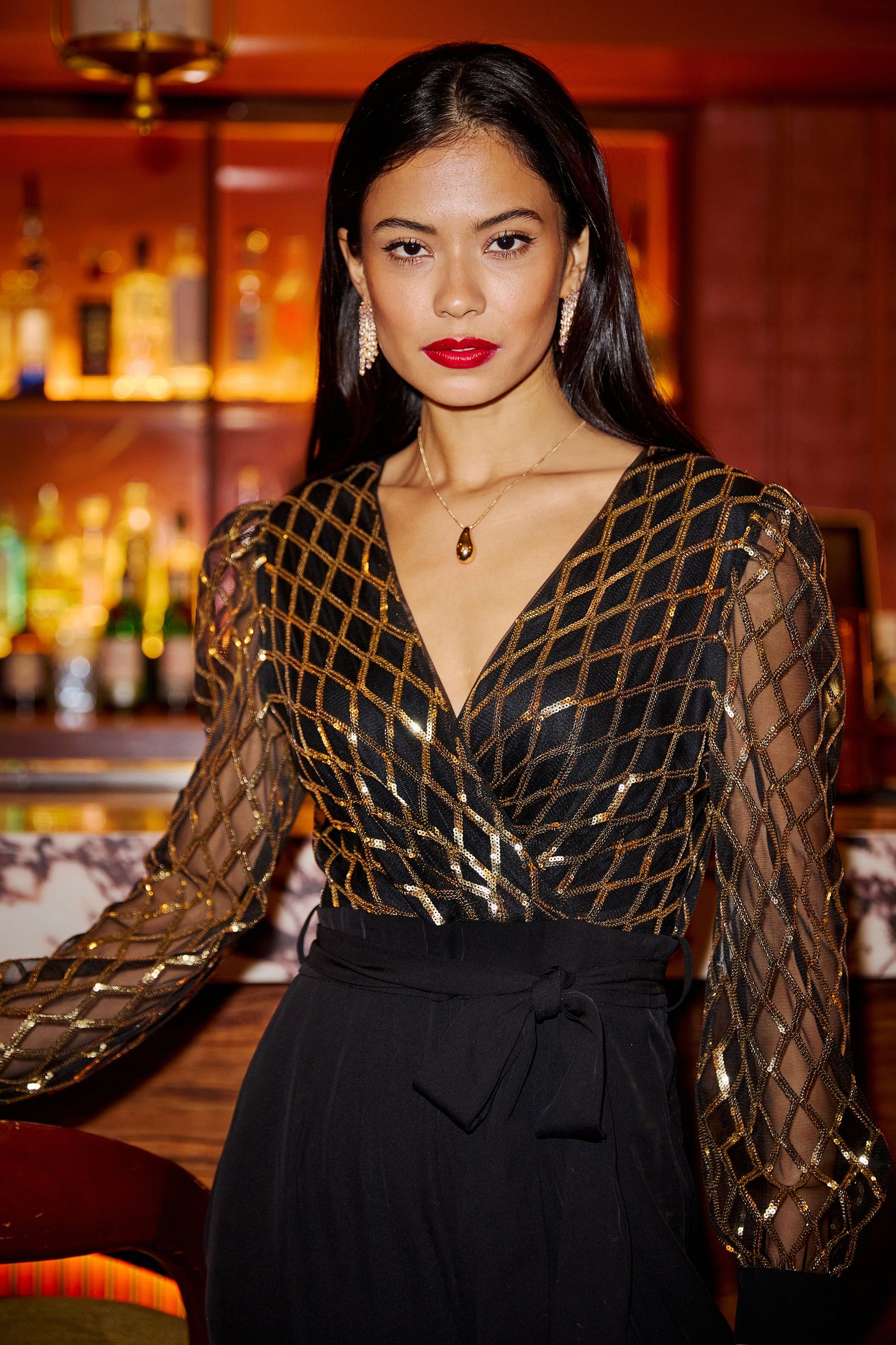 Black And Gold Sequin Wrap Over Jumpsuit - Sizes 8 to 16